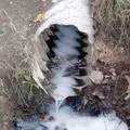 Chemicals exiting pipe